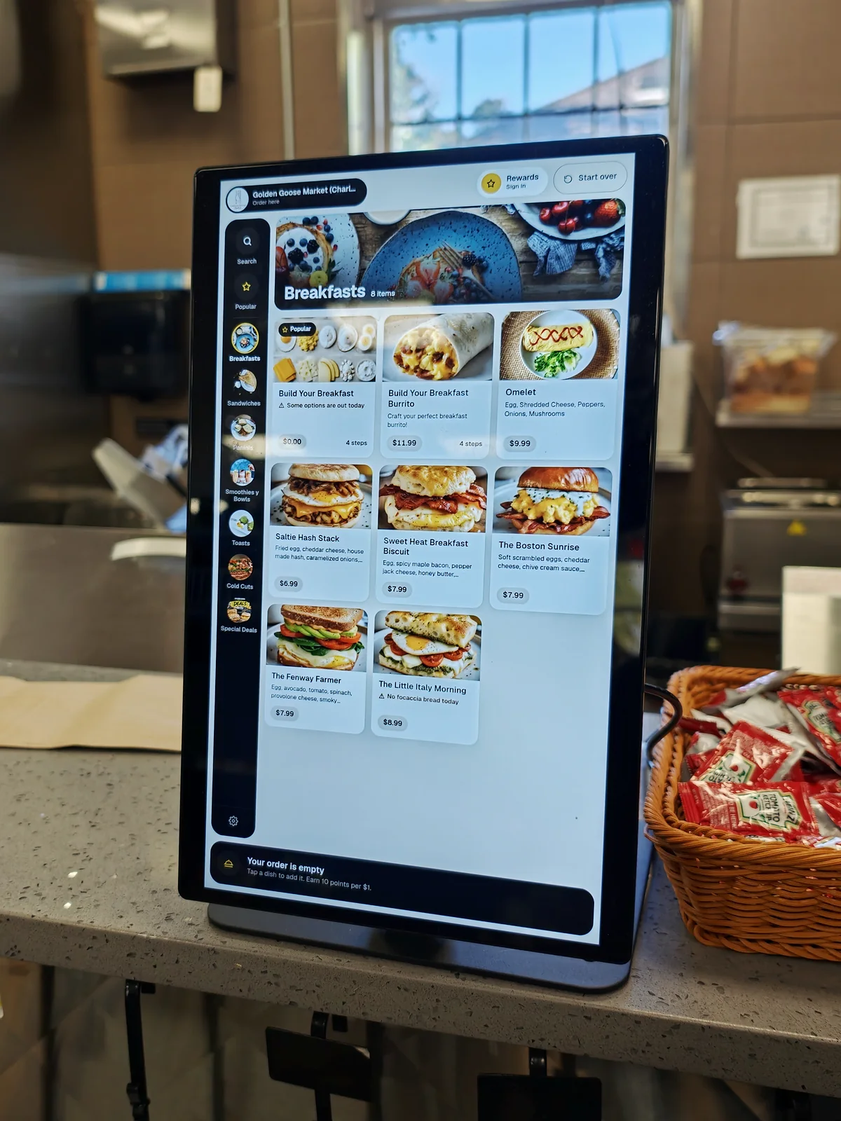 Thimi kiosk on the counter at Golden Goose Market, Charlestown