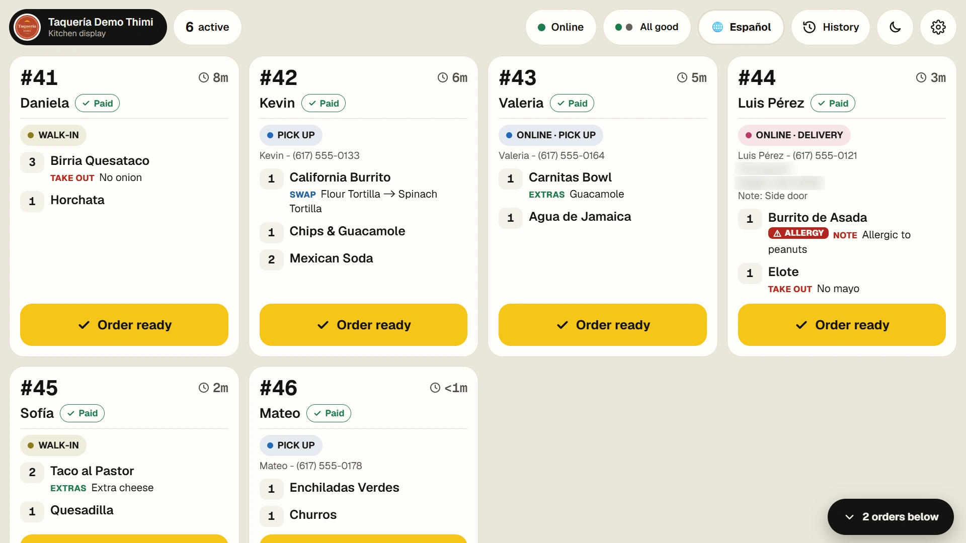 Kitchen display in day mode with six active orders, big order numbers, timers and yellow Order ready buttons.