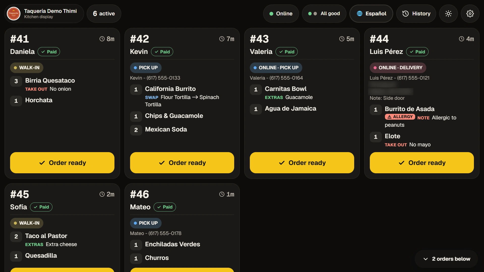 Kitchen display in night mode with the same six active orders on a dark background.